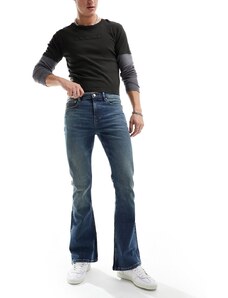 ASOS DESIGN - Jeans a zampa color blu lavaggio tinto