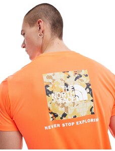 The North Face - Training Reaxion Redbox - T-shirt arancione con stampa sul retro