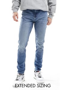 ASOS DESIGN - Jeans skinny con lavaggio blu chiaro vintage