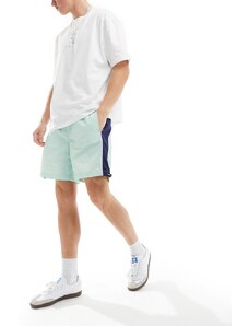 ASOS DESIGN - Pantaloncini ampi in nylon con vita elasticizzata color menta con pannelli laterali-Blu