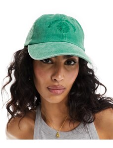 ASOS DESIGN - Cappellino verde slavato con scritta
