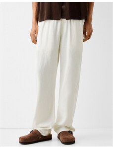 Bershka - Pantaloni con fondo ampio in lino bianco