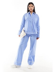 The Couture Club - Pantaloni blu a righe con profili a contrasto in coordinato