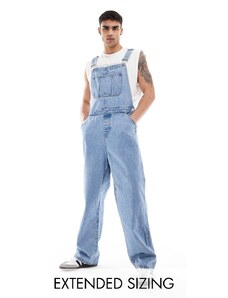 ASOS DESIGN - Salopette di jeans oversize lavaggio blu medio