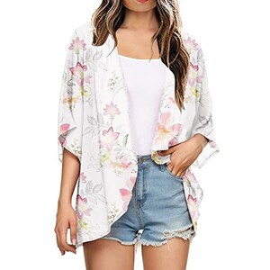 Modello per bolero all'uncinetto: coprispalle da donna con motivi quadrati ( taglie 30-44) - Italia