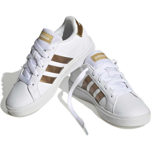 Adidas superstar bianche strisce oro online