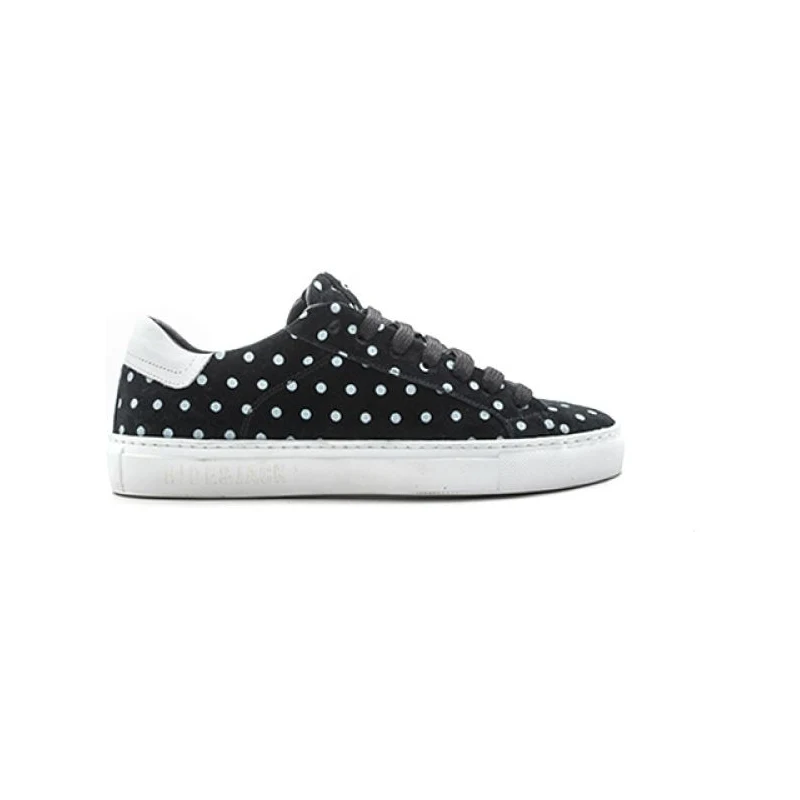 scarpe a pois bianche e nere