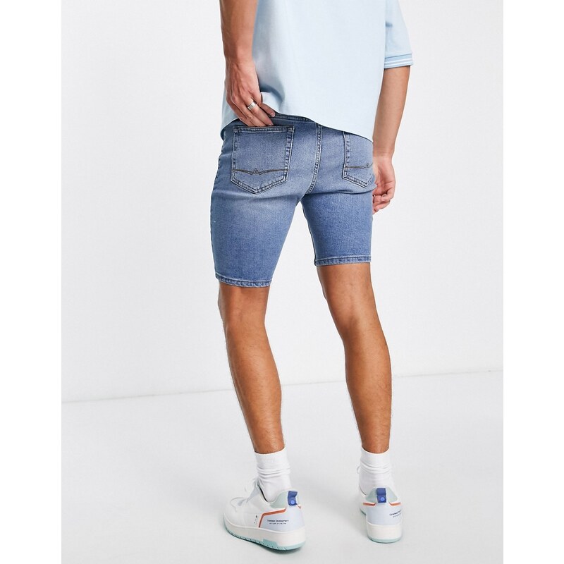 ASOS DESIGN - Pantaloncini di jeans skinny lunghezza normale blu lavaggio medio