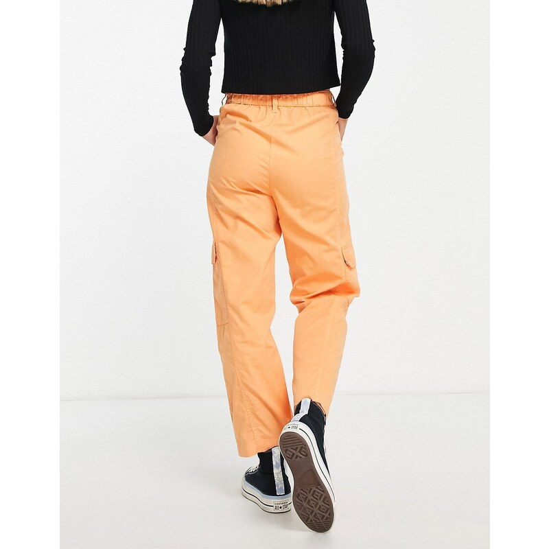 Miss Selfridge - Pantaloni cargo color albicocca con tasche laterali-Arancione