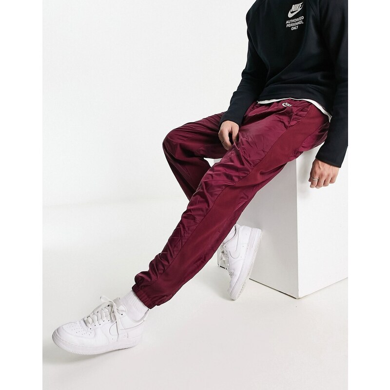 Nike - Circa Premium - Pantaloni casual invernali rosso barbabietola scuro testurizzato