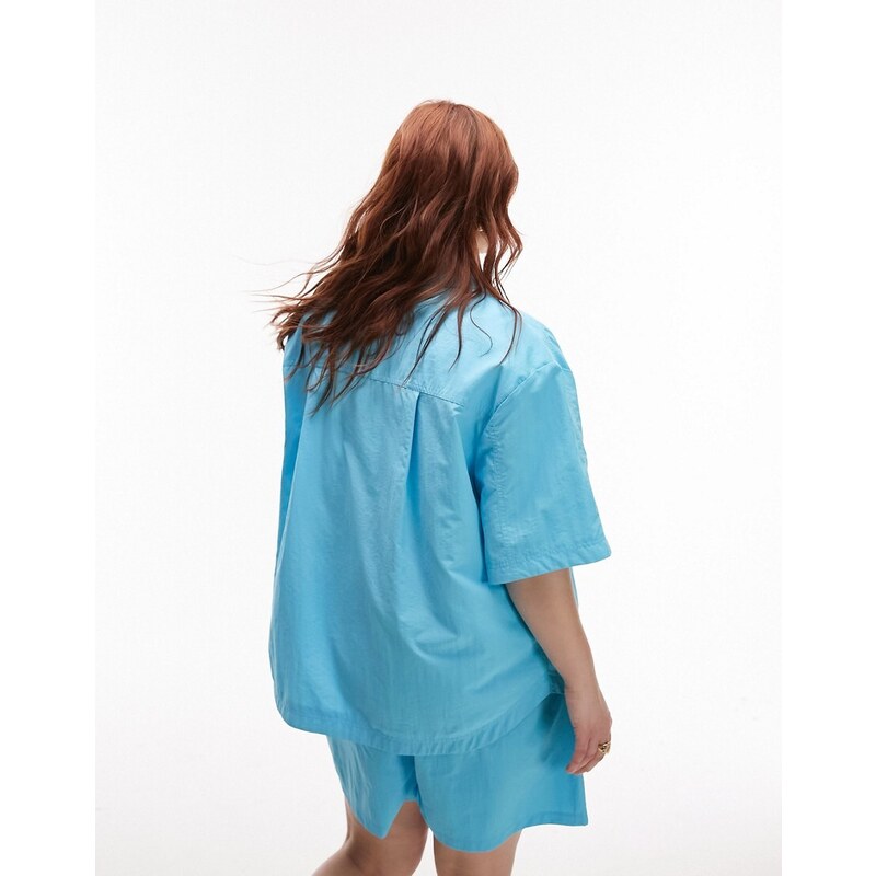 Topshop Curve - Camicia giacca blu oversize in nylon a maniche corte in coordinato