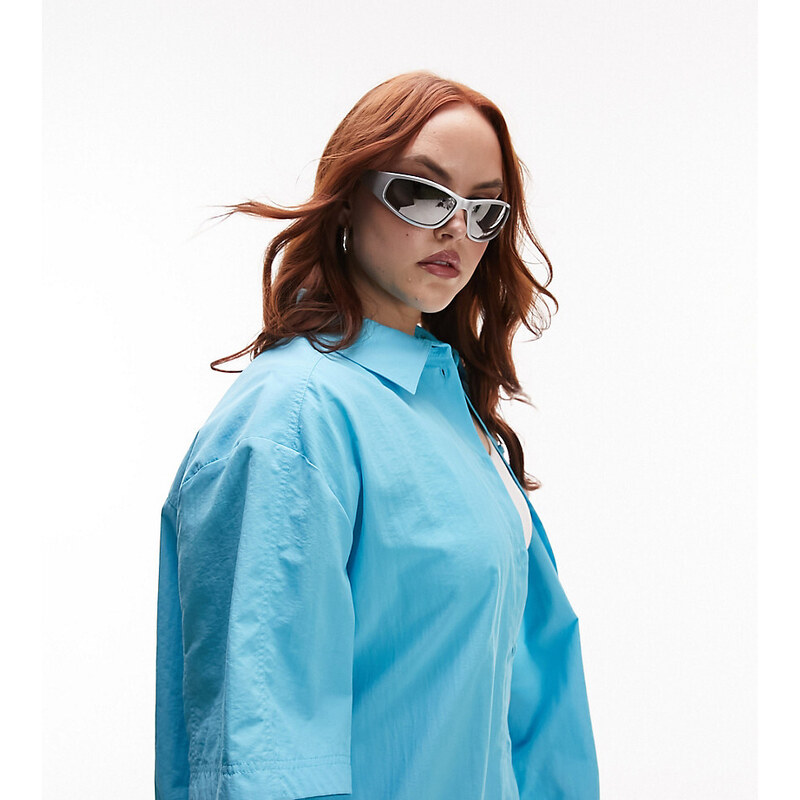 Topshop Curve - Camicia giacca blu oversize in nylon a maniche corte in coordinato