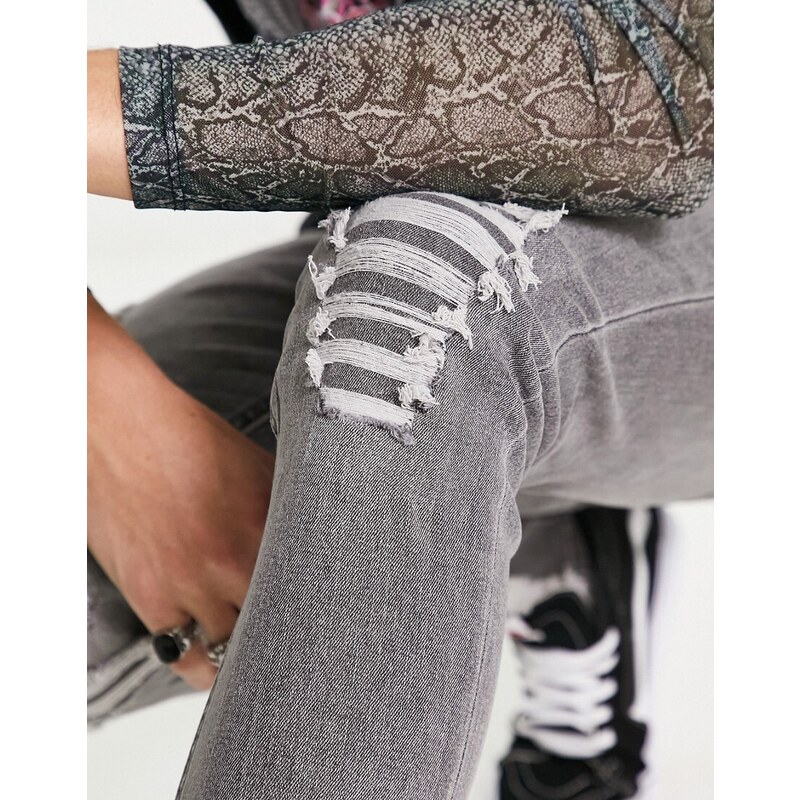 ADPT - Jeans skinny effetto spray grigio slavato con strappi vistosi