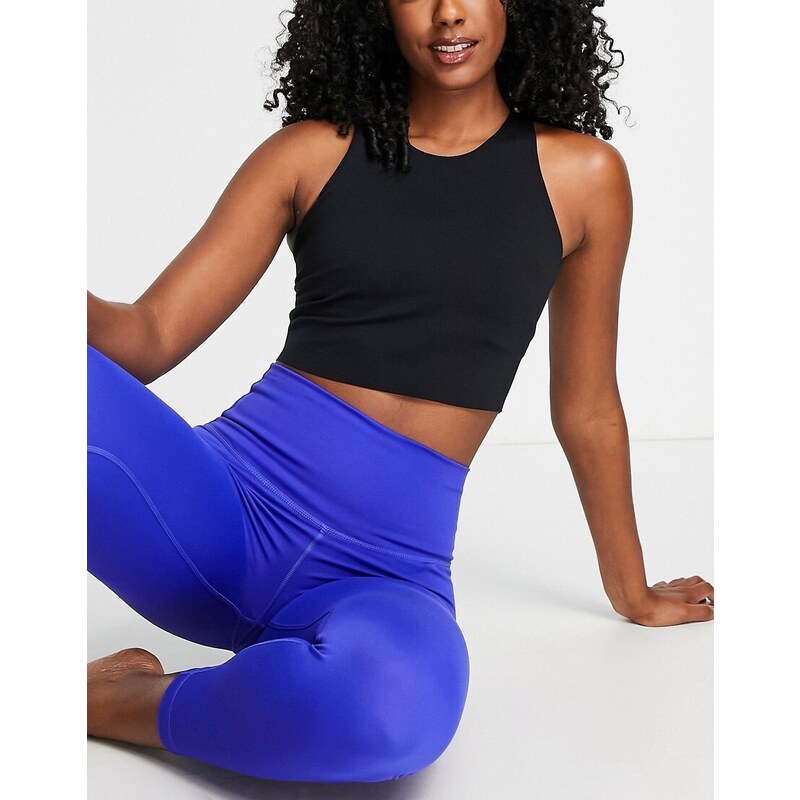 Nike Training Nike - Yoga Luxe - Crop top senza maniche nero in tessuto Dri-FIT