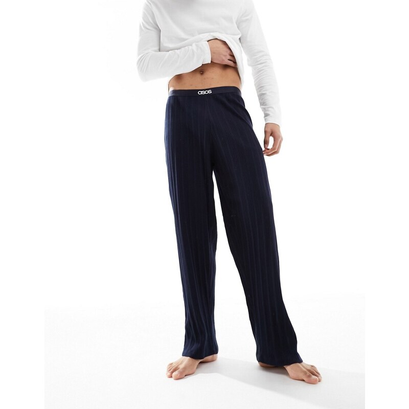 ASOS DESIGN - Set pigiama con maglietta a maniche lunghe e pantaloni blu navy a coste