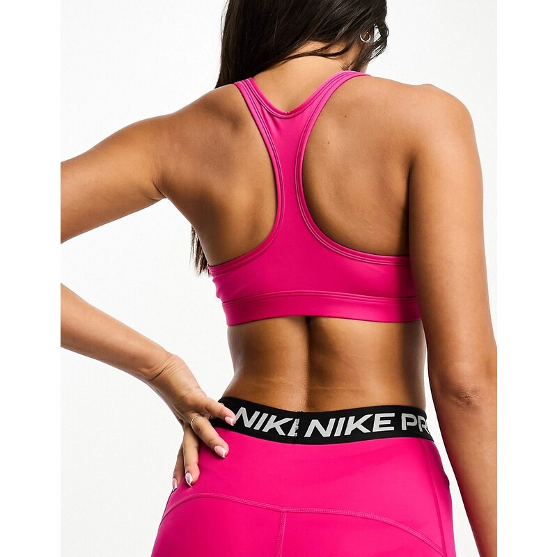 Nike Training - Swoosh Dri-FIT - Reggiseno sportivo a supporto leggero rosa fireberry