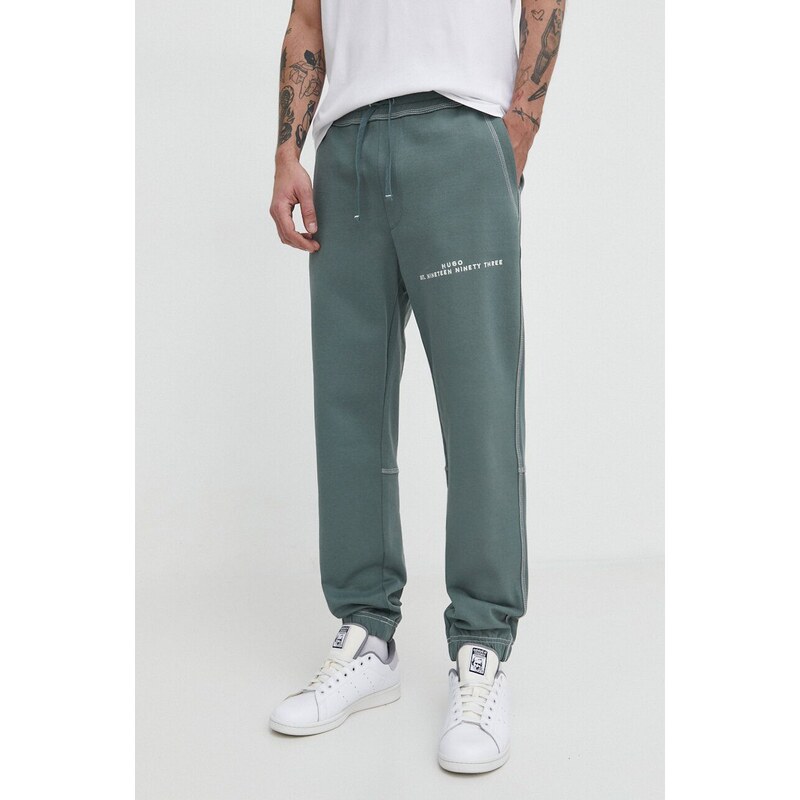 HUGO pantaloni da jogging in cotone colore verde con applicazione