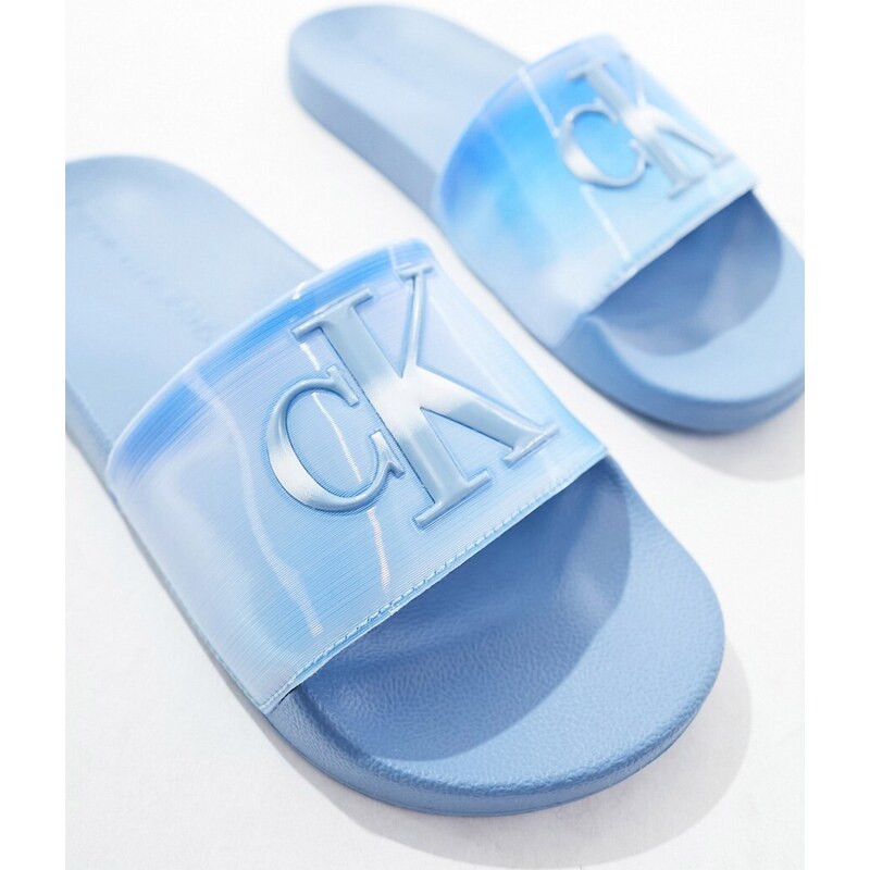 Calvin Klein Jeans - Sliders in gomma morbida blu con logo a monogramma