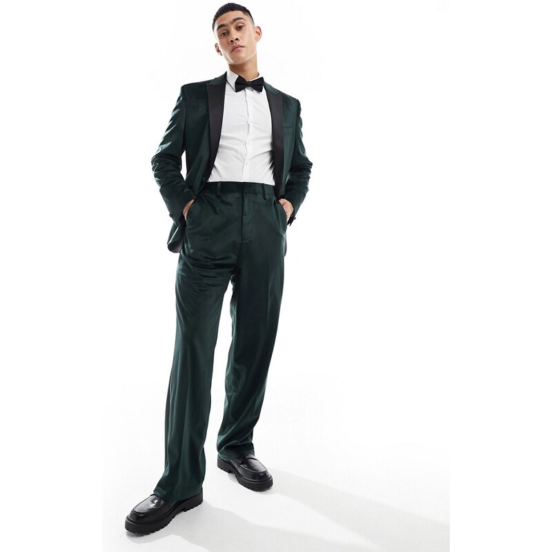 ASOS DESIGN - Pantaloni da abito stile smoking a fondo ampio verdi in velluto-Verde