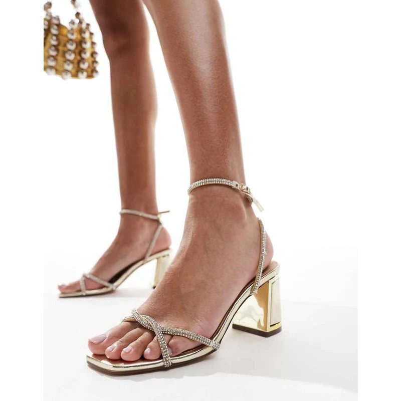 SEQWL Sandali con tacco largo medio color oro con listini decorati