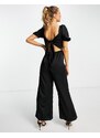 Miss Selfridge - Tuta jumpsuit in raso nero con bustino arricciato