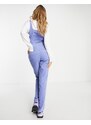 ASOS DESIGN - Tuta jumpsuit in velluto a coste blu con fondo svasato