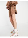 Nike - Pantaloncini marrone archaeo con nastro con logo Nike