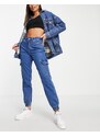 Urban Classics - Jeans multitasche lavaggio blu medio