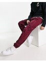 Nike - Circa Premium - Pantaloni casual invernali rosso barbabietola scuro testurizzato