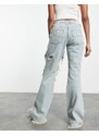 COLLUSION - x008 - Jeans da festival a zampa blu con strappi vistosi stile Y2K