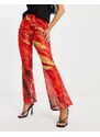 Annorlunda - Pantaloni con stampa effetto lava multicolore con gonna sovrapposta con laccio-Arancione