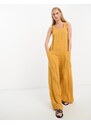 ASOS DESIGN - Tuta jumpsuit minimal stropicciata color senape-Giallo