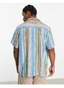 ASOS DESIGN - Camicia con rever comoda con stampa azteca blu