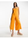 ASOS DESIGN - Tuta jumpsuit arancione con gonna pantalone e spalline sottili