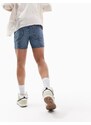 ASOS DESIGN - Pantaloncini di jeans skinny taglio corto lavaggio blu medio