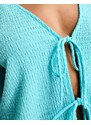 Monki - Blusa in jersey plissé azzurro con laccio sul davanti