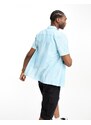 ASOS DESIGN - Camicia comoda in misto lino blu con stampa floreale e rever-Giallo