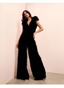 ASOS LUXE - Tuta jumpsuit in velluto nero con scollo ad anello, decorazione floreale e fondo ampio