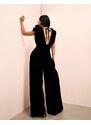 ASOS LUXE - Tuta jumpsuit in velluto nero con scollo ad anello, decorazione floreale e fondo ampio