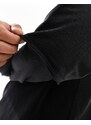 ADPT - T-shirt oversize nero slavato con maniche a doppio strato