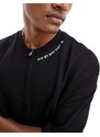 ADPT - T-shirt oversize nera pesante con stampa sul colletto e zip-Nero