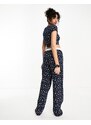 ASOS DESIGN Tall - Pantaloni del pigiama mix & match blu navy con stampa a fiorellini, fascia in vita esposta e finiture a festoncino