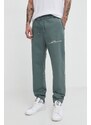 HUGO pantaloni da jogging in cotone colore verde con applicazione