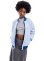 Nike - Giacca bomber double-face stile college colore blu