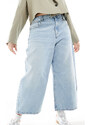 ASOS Curve ASOS DESIGN Curve - Jeans cropped a gamba bombata stretti in vita blu lavaggio medio