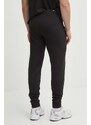 Puma pantaloni da jogging in cotone BETTER ESSENTIALS colore nero con applicazione 675980