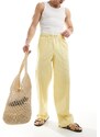 ASOS DESIGN - Pantaloni eleganti a fondo ampio in misto lino giallo polvere