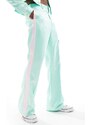 ASOS DESIGN - Pantaloni eleganti ampi in raso con riga laterale rosa in coordinato-Verde