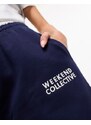ASOS WEEKEND COLLECTIVE ASOS DESIGN Weekend Collective - Joggers pesanti blu navy con dettaglio stile fascia in vita